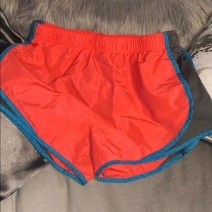 Orange Nike shorts